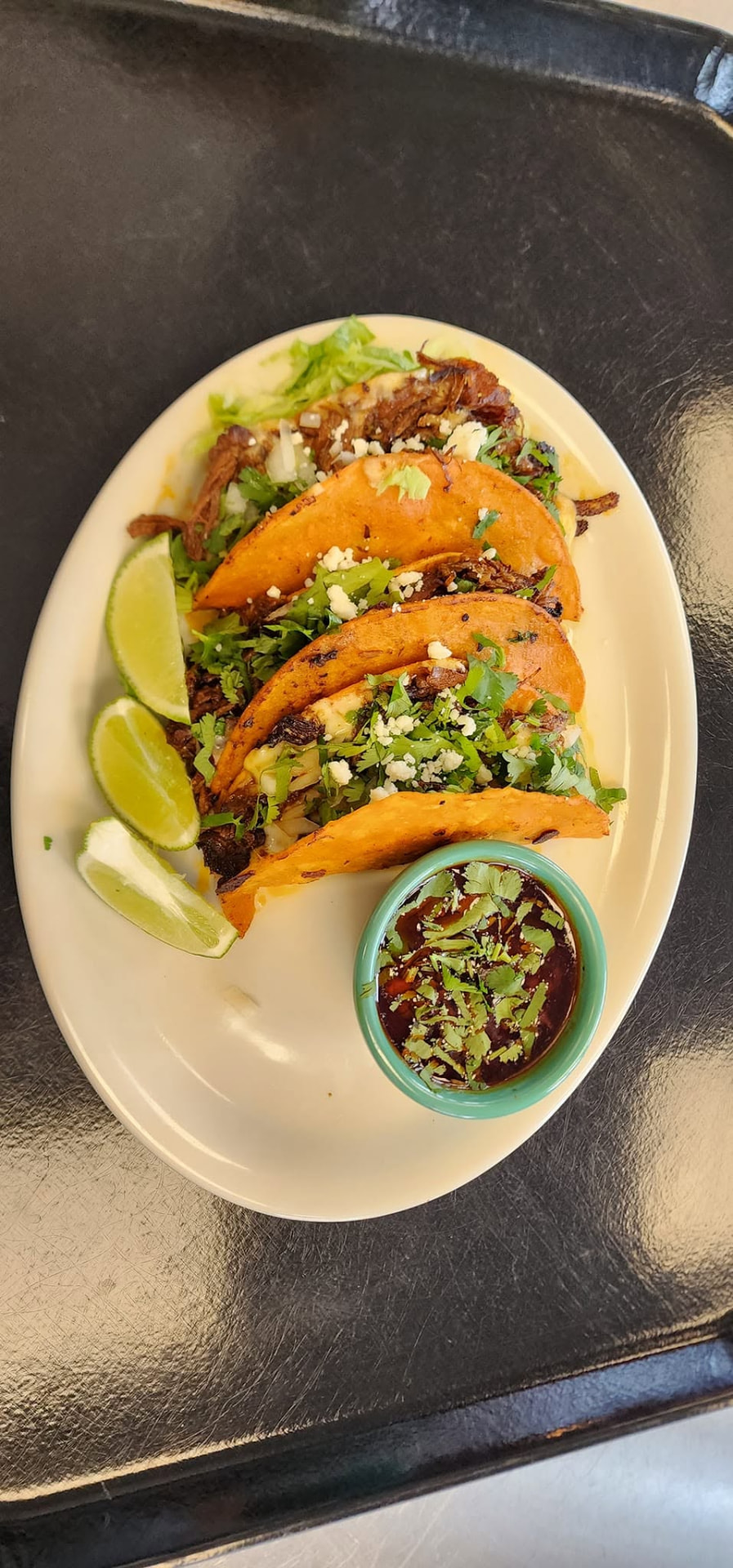 Santiago's quesabirria tacos with consomé for dipping